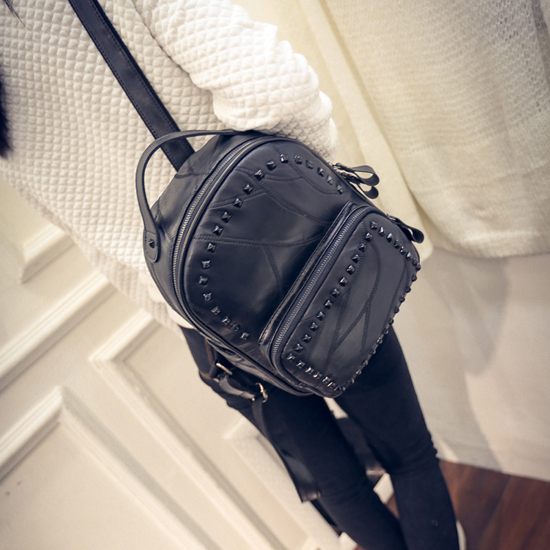 新款雙肩包女韓版時尚拼接背包休閑學院風鉚釘書包旅行小包包